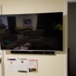 Wall mounted TV with sound bar