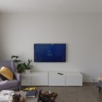 living room with mounted TV