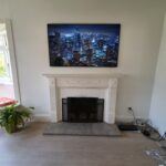 Above fireplace TV mount
